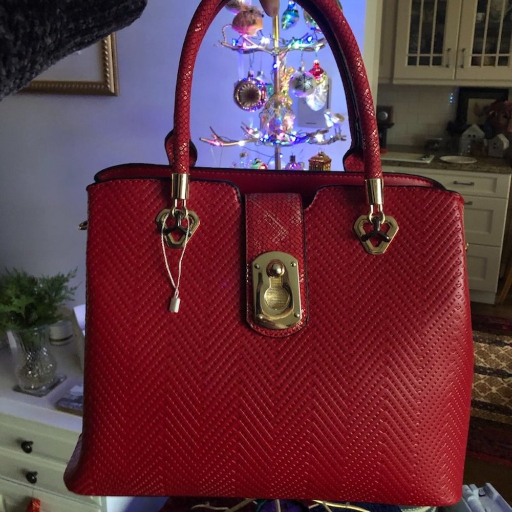 Red Handbag Faux leather tote with gold buckle